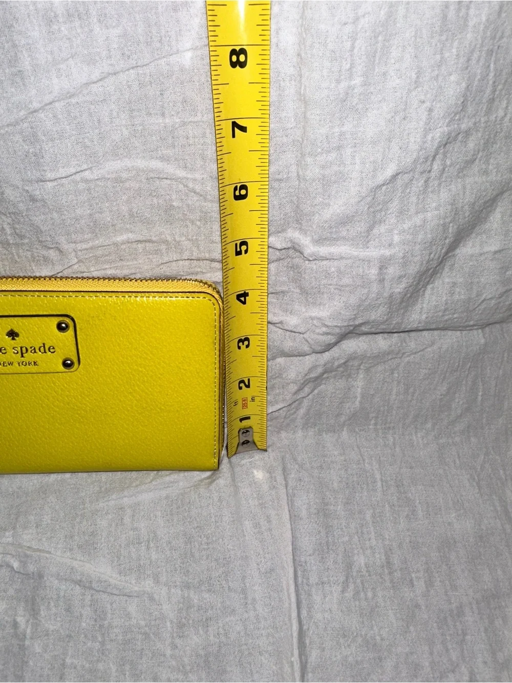 kate spade Yellow Zip-Around Leather Wallet with Logo Plaque